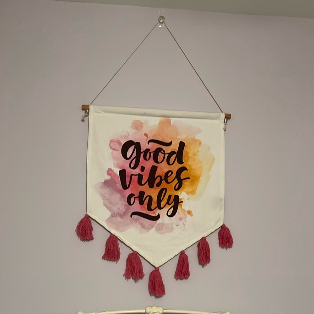Sign with tassels